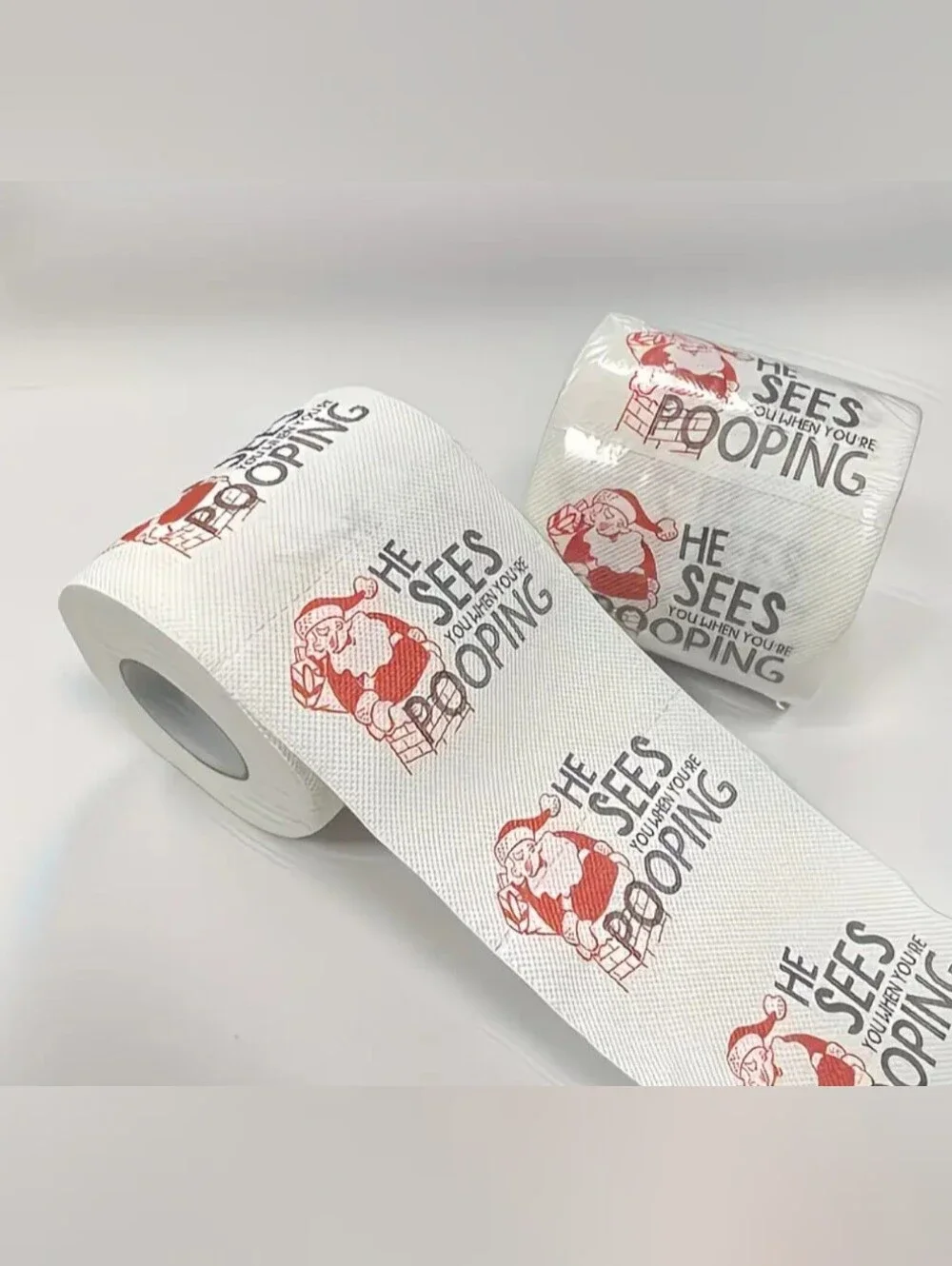 Novelty Santa Toilet Paper Roll - White with Red Print